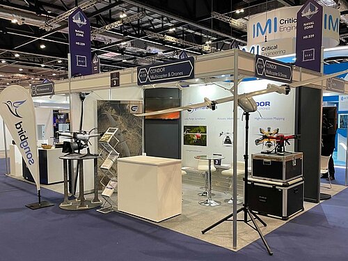 Messestand mit Germandrones Drohnen bei DSEI London mit